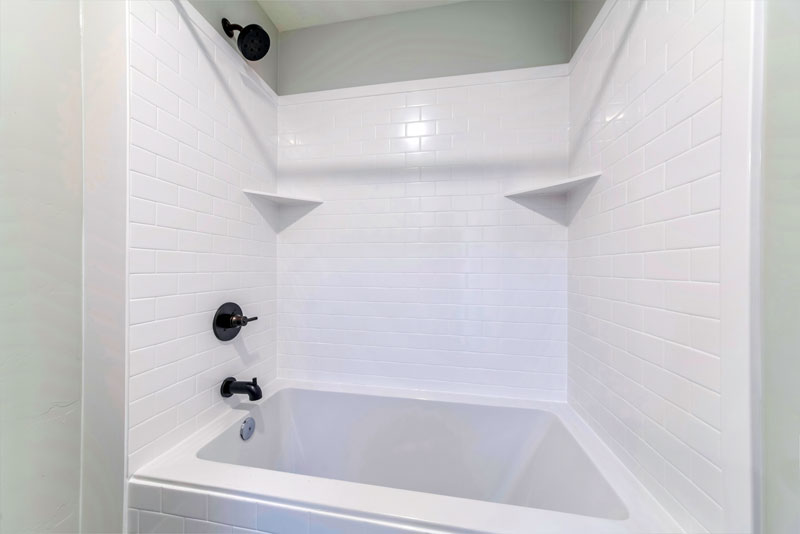 white bathtub insert